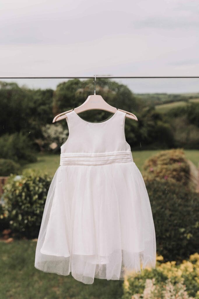flower girl dress hung up