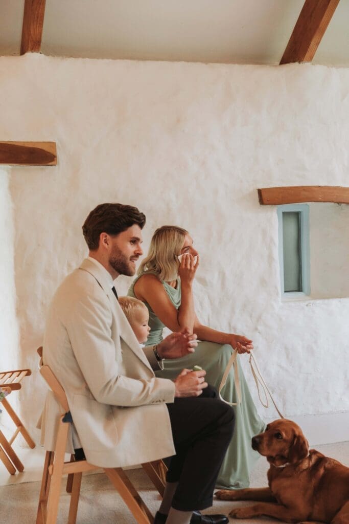bridesmaid wiping away a tear