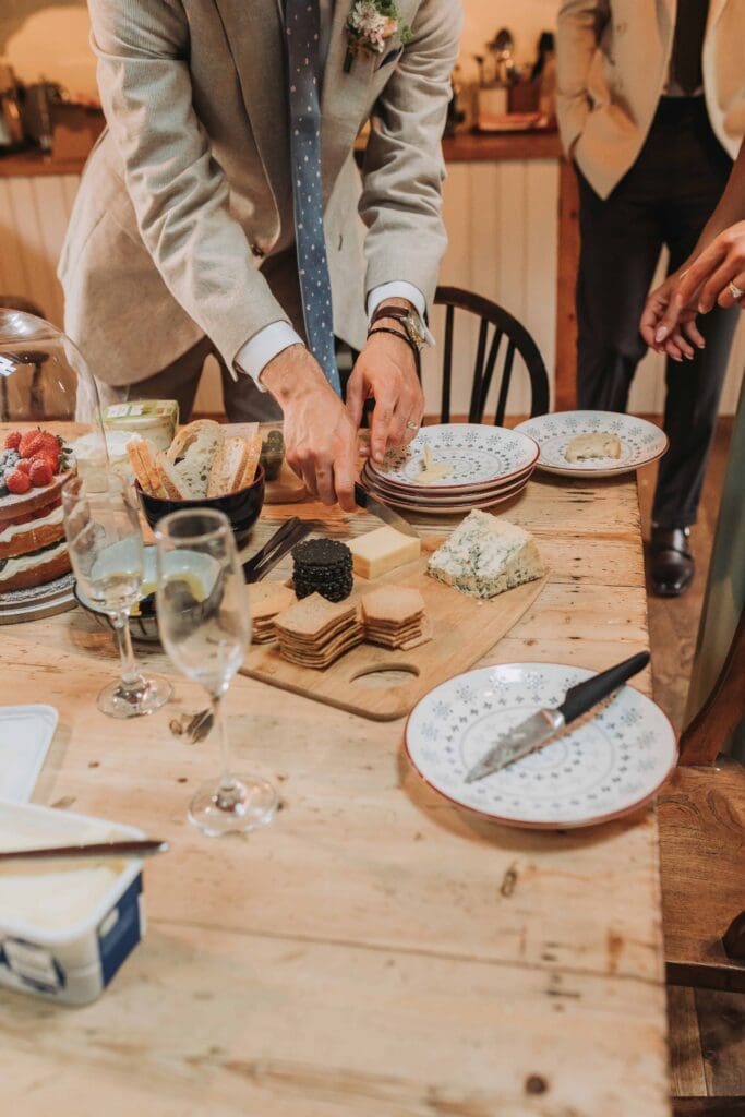 cheese board getting cut on table
