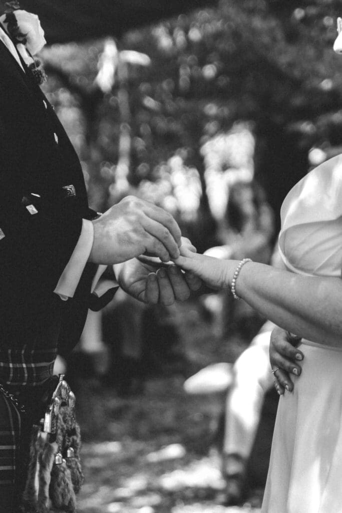 ring exchange at woodland wedding