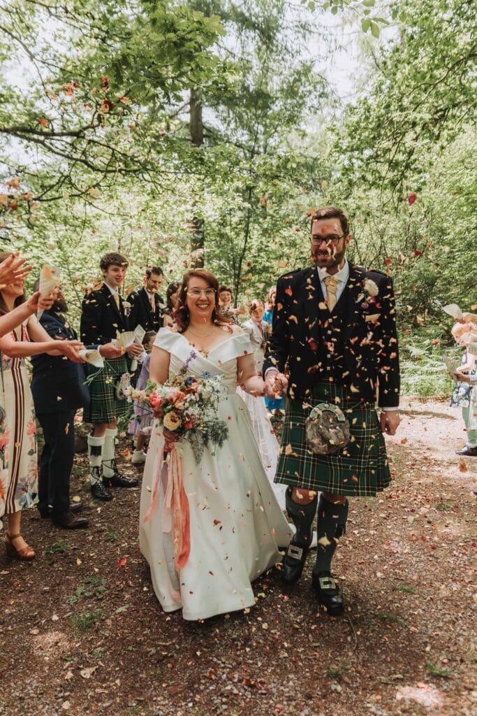 confetti moment at woodland wedding in devon