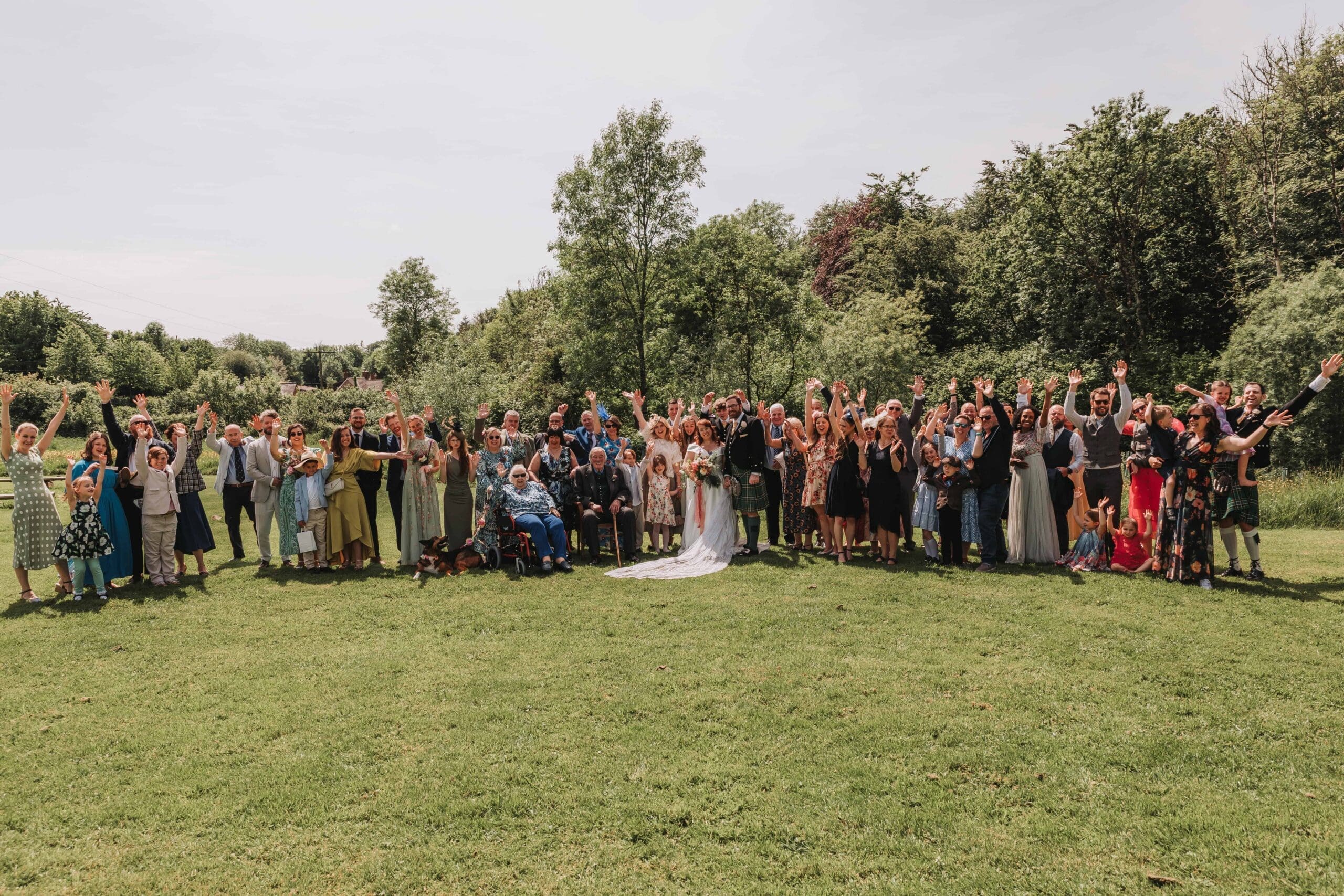 group photo at woodland wedding