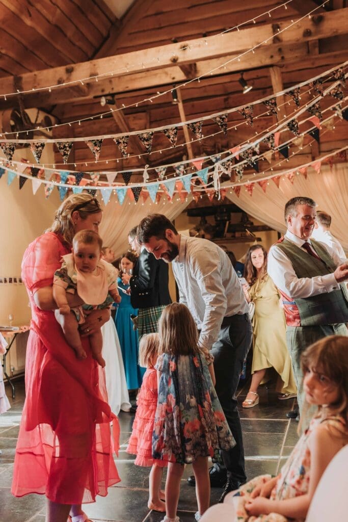 guests dancing at woodland wedding