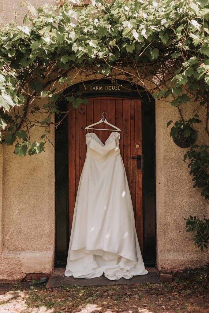dress hung up at middle coombe farm wedding