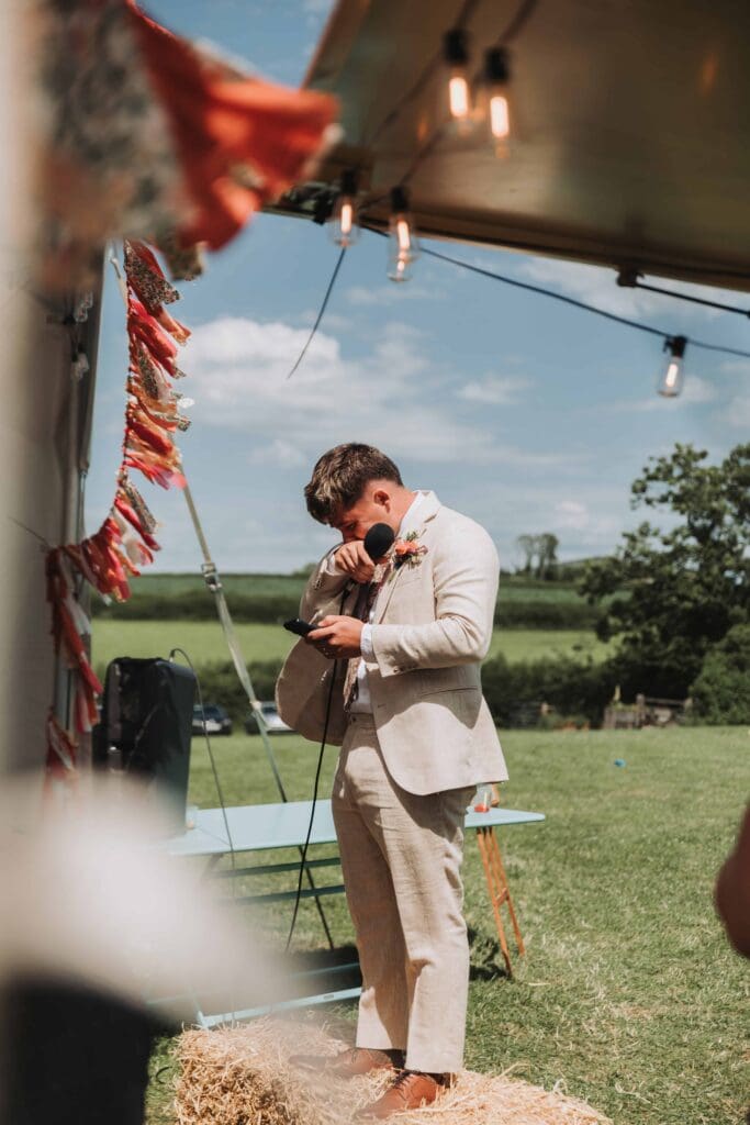groom getting emotional during speech