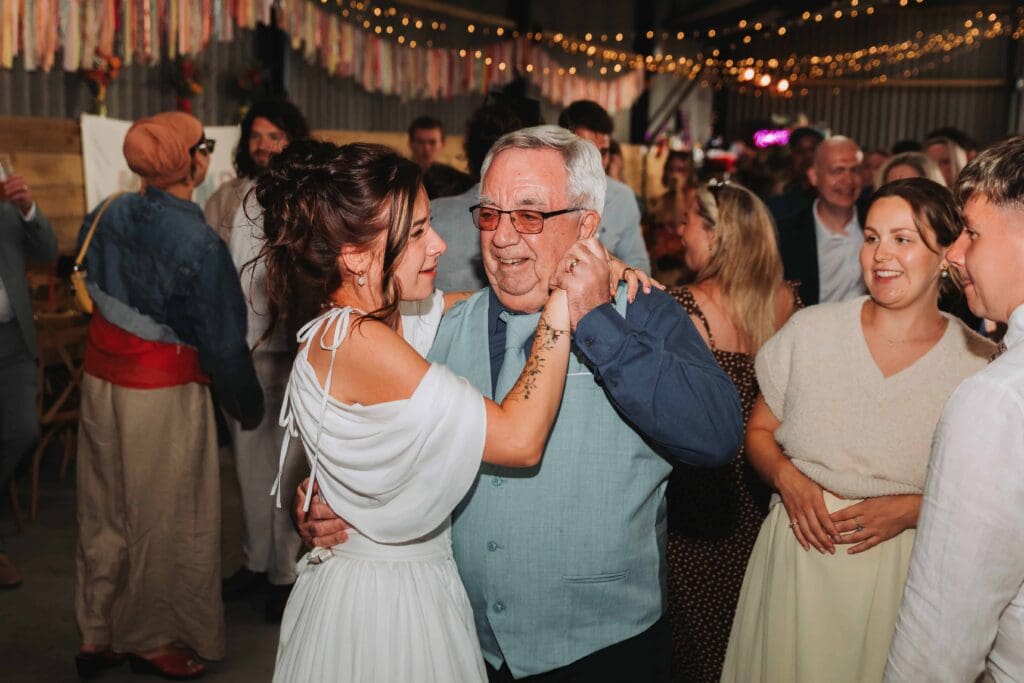 grandad dancing with bride at holsome park wedding